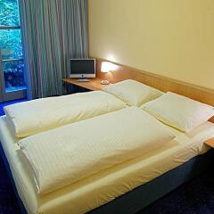 Отель Commundo Tagungshotel Ismaning Германия, Исманинг - отзывы, цены и фото номеров - забронировать отель Commundo Tagungshotel Ismaning онлайн комната для гостей фото 5