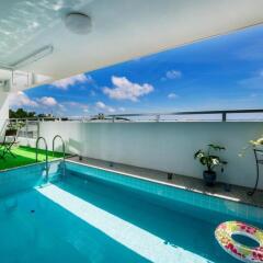 Отель Ocean View Condominium Томигусуку бассейн