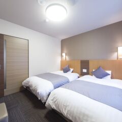 Отель Dormy Inn Toyama Natural Hot Spring Тояма комната для гостей фото 2