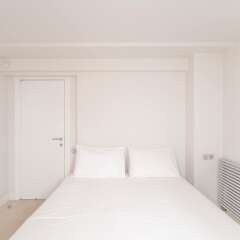 Отель Athens Beachfront Luxury Villa Греция, Афины - отзывы, цены и фото номеров - забронировать отель Athens Beachfront Luxury Villa онлайн комната для гостей фото 2