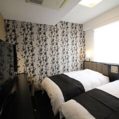 APA Hotel Nagasaki-Ekimae Нагасаки комната для гостей фото 2