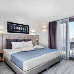 Отель Nymphes Deluxe Accommodation Греция, Пефкохори - отзывы, цены и фото номеров - забронировать отель Nymphes Deluxe Accommodation онлайн комната для гостей