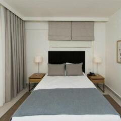 Апартаменты Kusadasi Golf and Spa Apartments Сельчук комната для гостей фото 4