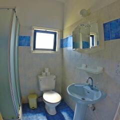 Konnos Bay Hotel Apartments ванная