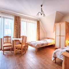 Апартаменты Visitzakopane City Apartments Закопане комната для гостей фото 5