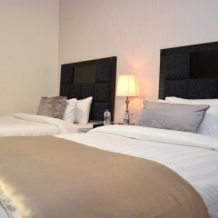 Tilal Almadina Hotel & Suites комната для гостей
