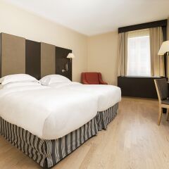 NH Geneva Airport Hotel комната для гостей