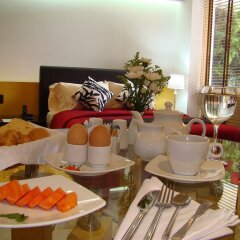 Отель OfiHotel Versalles Cali Колумбия, Кали - отзывы, цены и фото номеров - забронировать отель OfiHotel Versalles Cali онлайн питание