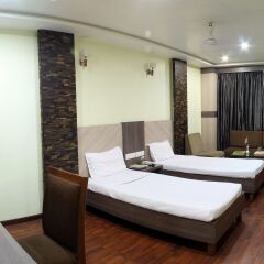 Hotel puneet international комната для гостей