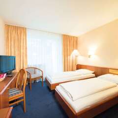 Отель Comfort Hotel Am Medienpark Германия, Унтерфёринг - отзывы, цены и фото номеров - забронировать отель Comfort Hotel Am Medienpark онлайн комната для гостей фото 4