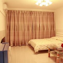 Апартаменты Xingfu Huafu Apartment комната для гостей фото 5