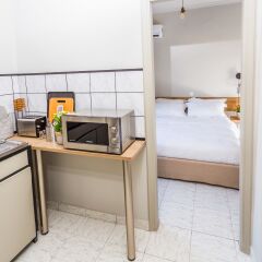 Отель Aris Athens Suites в номере фото 2