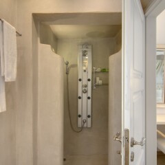 Отель Santorini Secret Suites & Spa ванная фото 4