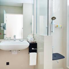 Отель Holiday Inn Doha - The Business Park ванная фото 2