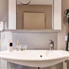 Отель Aparthotel Adagio Frankfurt City Messe ванная фото 2
