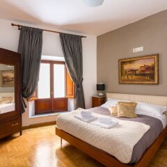 Отель Trevispagna Charme Apartment Италия, Рим - отзывы, цены и фото номеров - забронировать отель Trevispagna Charme Apartment онлайн комната для гостей фото 4