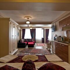 Отель Safran Suites Apart в номере