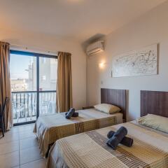 Отель Seashells Self Catering Apartment Мальта, Буджибба - отзывы, цены и фото номеров - забронировать отель Seashells Self Catering Apartment онлайн комната для гостей фото 3