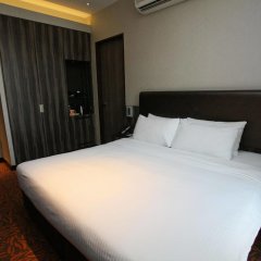 Отель Aqueen Hotel Kitchener Сингапур, Сингапур - 1 отзыв об отеле, цены и фото номеров - забронировать отель Aqueen Hotel Kitchener онлайн комната для гостей фото 3