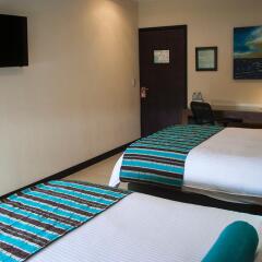 Country Hotel and Suites удобства в номере фото 2