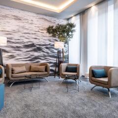Отель Courtyard by Marriott Munich City Center интерьер отеля
