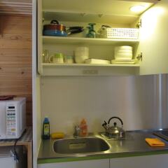 Отель Cottage Orange House Yakushima Якусима в номере