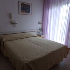 Hotel Manù Римини комната для гостей