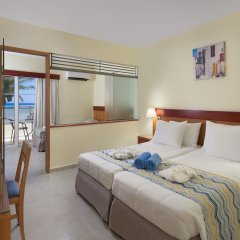 Avra Beach Resort Hotel & Bungalows - All Inclusive in Ialysos, Greece from 159$, photos, reviews - zenhotels.com guestroom photo 3