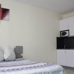 Апартаменты LOFT STUDIO Oktyabrya 52 в номере фото 2