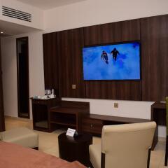Отель Monty Suites & Golf удобства в номере