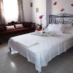 Отель Atalos Suites комната для гостей фото 2