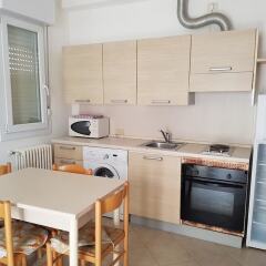 Апартаменты Residence 1 Uno Studio & Suites Римини в номере фото 2