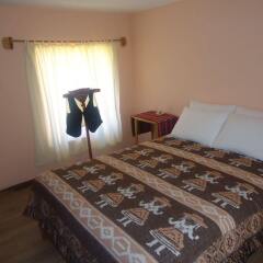 Отель Titicaca Lodge комната для гостей