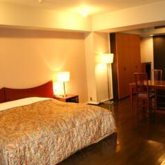 Отель Residential Suites Fukuoka Фукуока удобства в номере фото 2