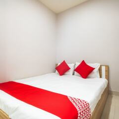 Апартаменты OYO 103 Airport Family Apartment комната для гостей
