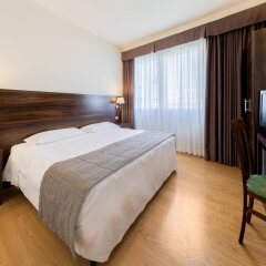 Отель Quality Hotel Delfino Venezia Mestre Италия, Венеция - 8 отзывов об отеле, цены и фото номеров - забронировать отель Quality Hotel Delfino Venezia Mestre онлайн комната для гостей фото 2