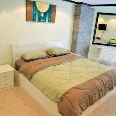 Отель Sleek 1 bed Condo Jomtien Паттайя комната для гостей