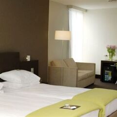 Отель NH Amsterdam Caransa 4* Улучшенный номер с различными типами кроватей фото 2