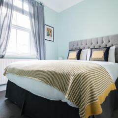 Апартаменты The Euston St Pancras Apartments комната для гостей фото 3