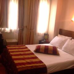 Abella Hotel комната для гостей