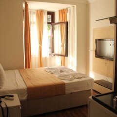 Отель Hot Residence Taksim Square Стамбул комната для гостей фото 3