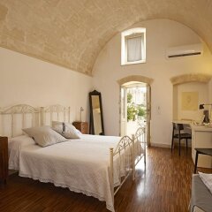 Отель Fra I Sassi - Residence Матера комната для гостей фото 3