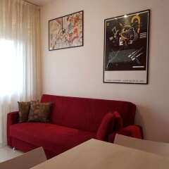 Апартаменты Sunset Apartment Римини комната для гостей фото 3