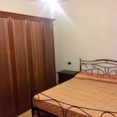 Апартаменты Apartment With 2 Bedrooms in Bovalino, With Pool Access, Furnished Balcony and Wifi - 300 m From the Beach Бовалино-Марина комната для гостей