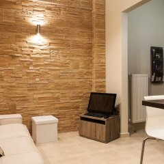 Апартаменты Gold and Blue Luxurious Apartment комната для гостей фото 4