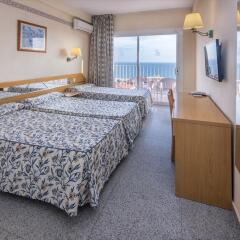 Hotel Catalonia комната для гостей