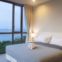 Отель Beachfront Sea View Baan Plai Haad Паттайя комната для гостей