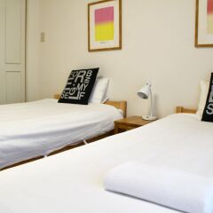 Отель Hukuhuku Guesthouse Хаката комната для гостей фото 3