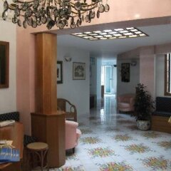 Отель Holidays Baia D'Amalfi Италия, Амальфи - отзывы, цены и фото номеров - забронировать отель Holidays Baia D'Amalfi онлайн интерьер отеля
