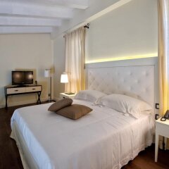Отель I Monasteri Golf Resort Сиракуза комната для гостей фото 3